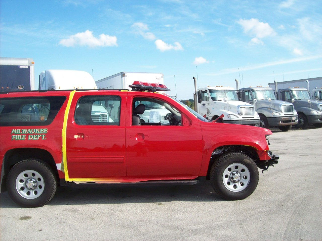 Milwaukee Fire Department Suburban in for body and collision repair at Custom Finishes